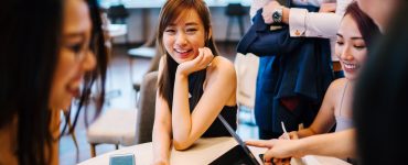 woman sitting on gray chair 1543895 2